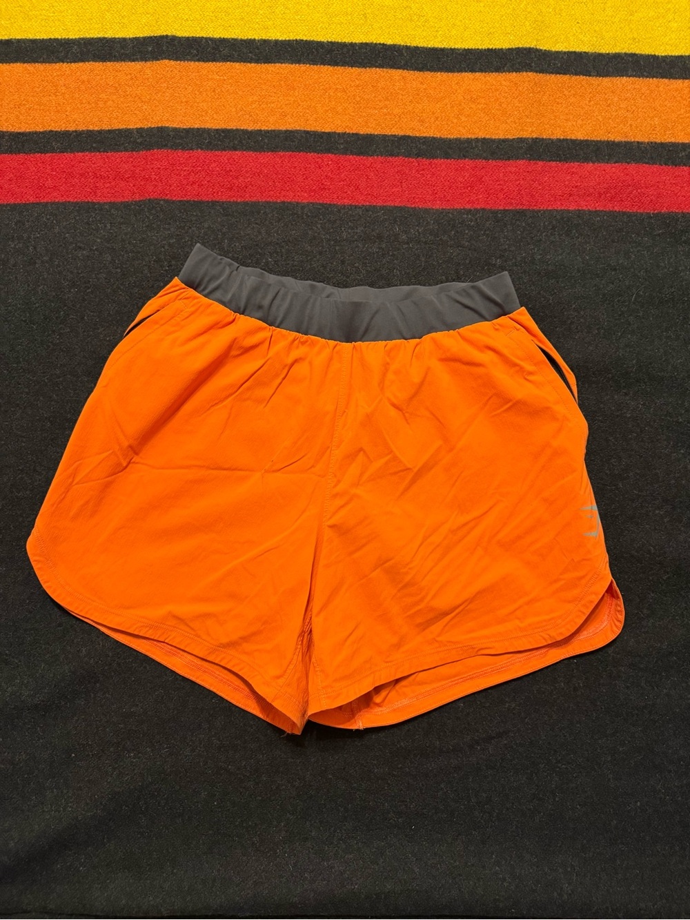 Gymshark Men’s Orange Athletic Shorts with Gray Waistband
